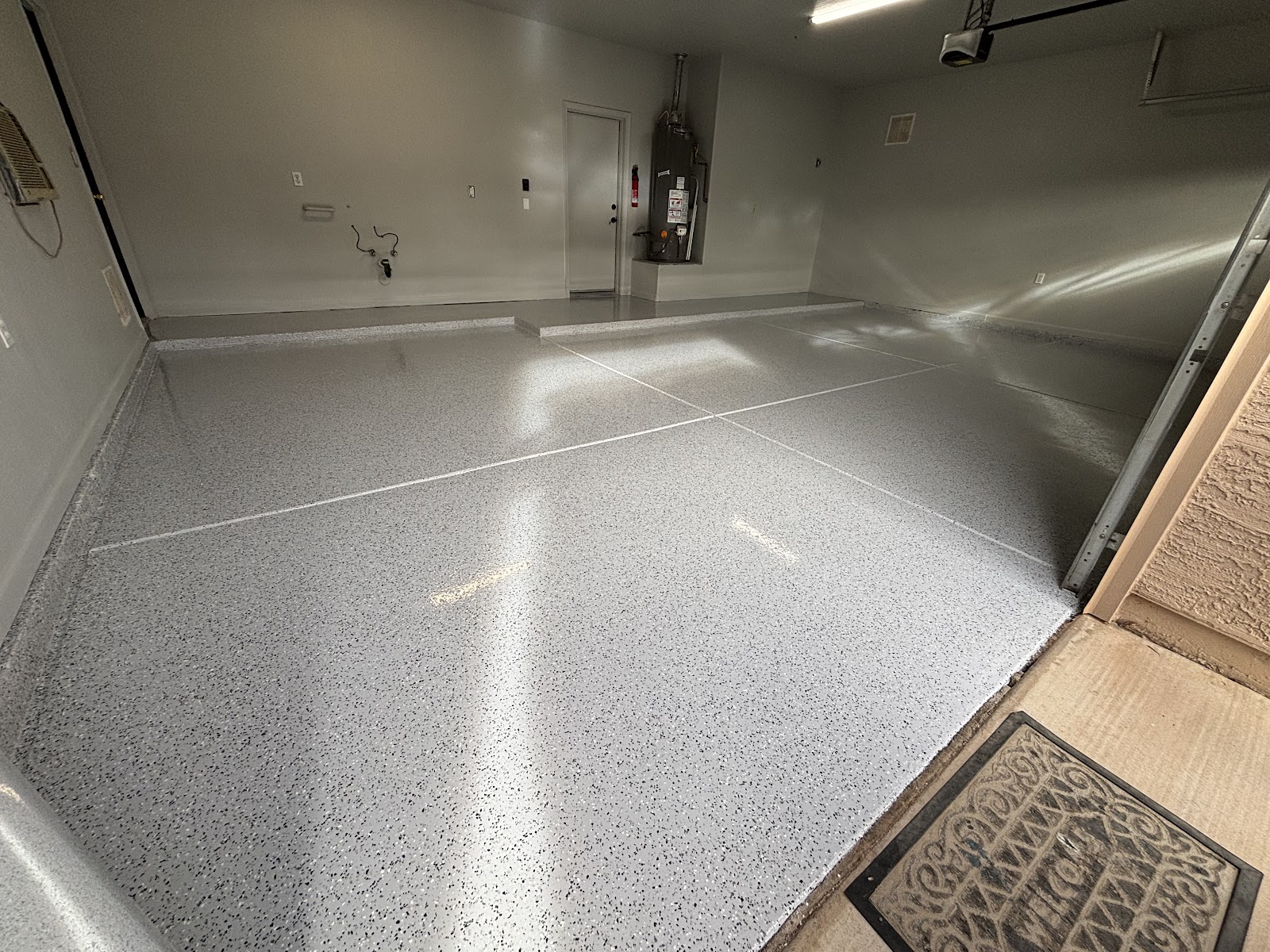 Medium Flake floor laid by AMR Concrete Coatings
